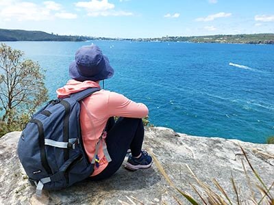 Bondi-to-Manly-Walker-looking-over-ocean-from-rock